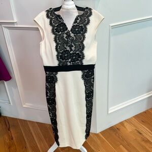 Fitted black and white dress – – very slimming